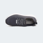 Grey sports shoes for unisex, featuring slip-on design and breathable engineered mesh upper.