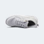 Caliber Shoes men's light grey mesh sports sneakers with white EVA sole and metallic detailing.