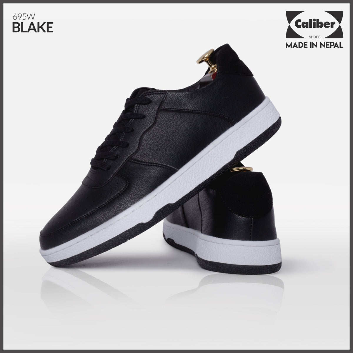 Pair of BLAKE black leather sneakers for men with white sole, styled product shot